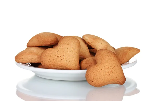 Heart-shaped cookies on white plate isolated on white — Stock Photo, Image