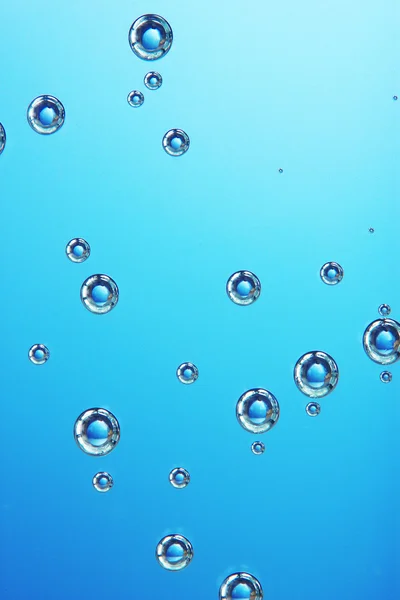 Acqua blu borbotta primo piano — Foto Stock