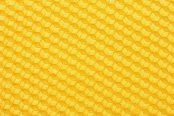 Tło żółty piękny plaster miodu — Zdjęcie stockowe