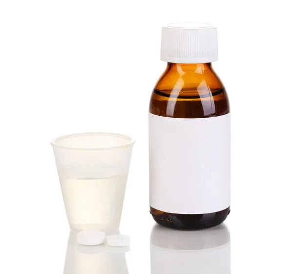 Medical bottle and jigger isolated on white — Stock Photo, Image