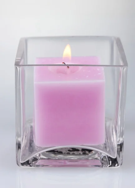 Beautiful purple candle isolated on white — Stock Photo, Image