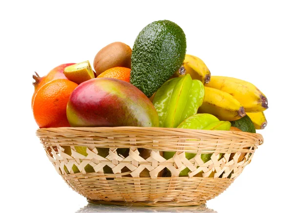 Surtido de frutas exóticas en cesta aislada sobre blanco —  Fotos de Stock