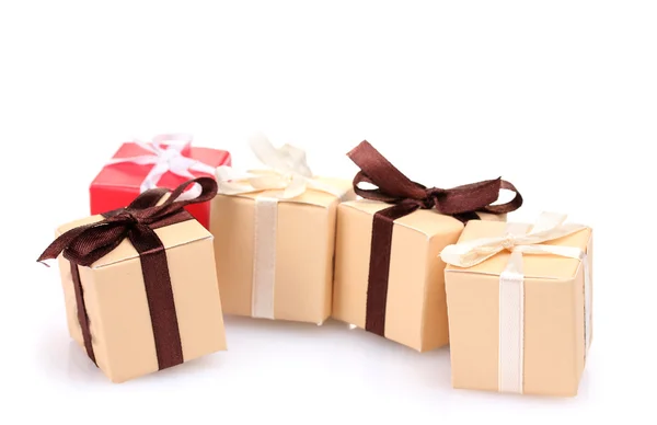Beautiful gifts with bows isolated on white — Stock Photo, Image