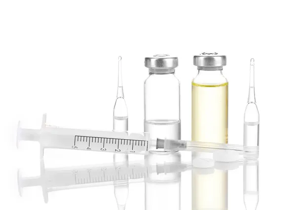 Syringe and medical ampoules isolated on white — Stock Photo, Image