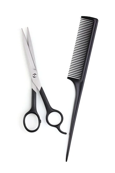 Hair cutting shears and comb isolated on white — Stock Photo, Image