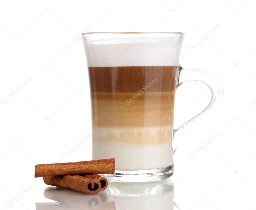 Fragrant сappuccino latte in glass cup and cinnamon isolated on white