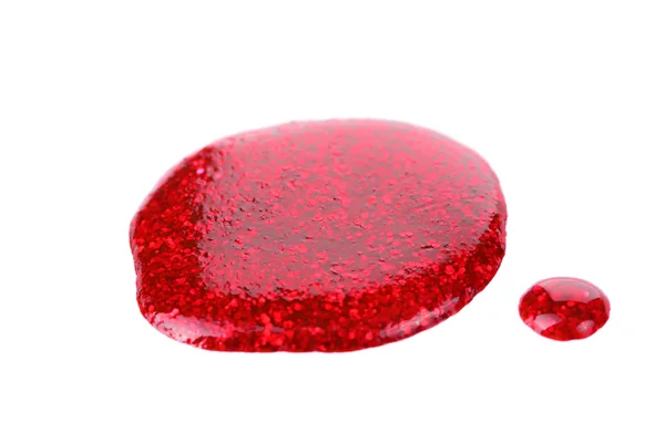 Gotas de esmalte rojo aisladas en blanco — Foto de Stock
