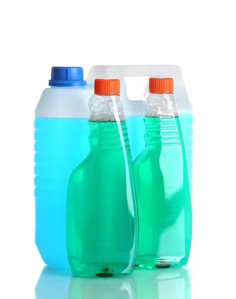 Canister with liquid and detergent bottles isolated on white — Stock Photo, Image