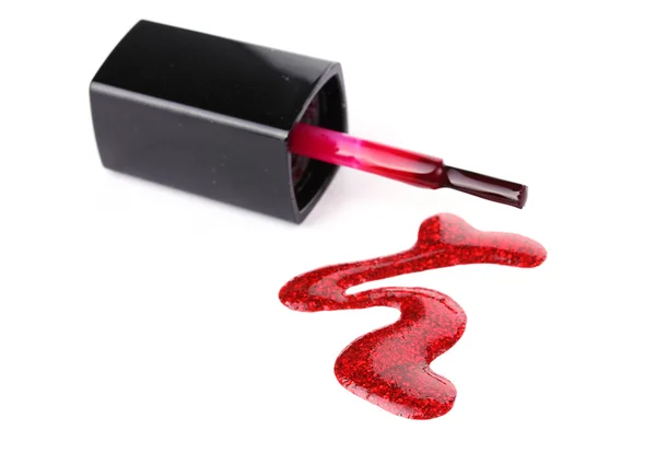 Esmalte de uñas rojo y cepillo aislado en blanco —  Fotos de Stock