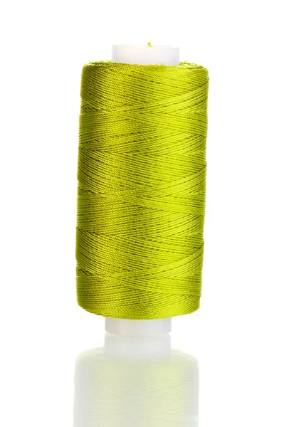 Green bobbin thread isolated on white — Stock Photo, Image