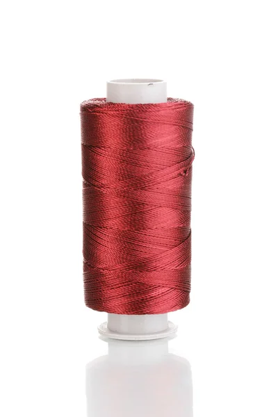 Brown bobbin thread isolated on white — Stock Photo, Image