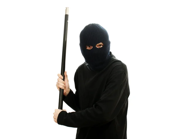 Бандит в чорній масці з трубою ізольовано на білому — стокове фото