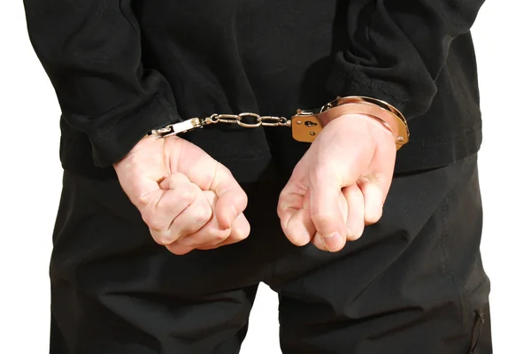 Бандит в чорній масці в наручниках ізольований на білому — стокове фото
