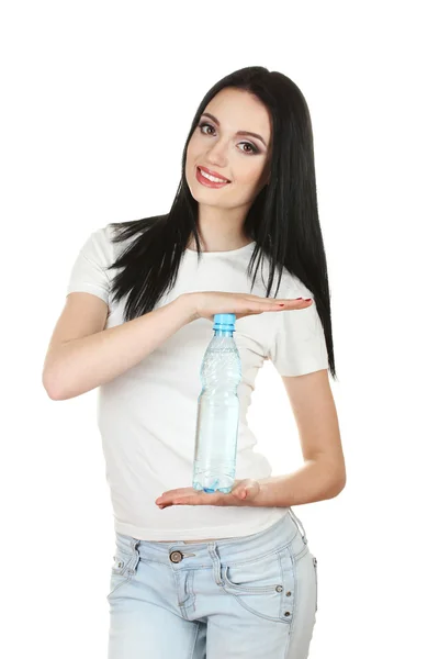Beautiful young girl and bottle of water isolated on white — Stock Photo, Image