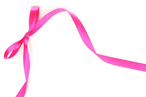Рожевий атласний лук і стрічка ізольовані на білому — стокове фото