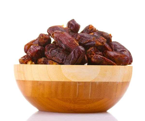 Delicious dried dates in wooden bowl isolated on white — Stock Photo, Image