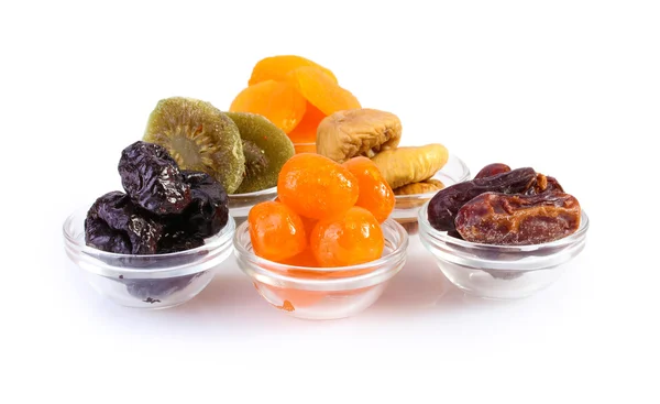 Dried fruits in bowls isolated on white — Stock Photo, Image