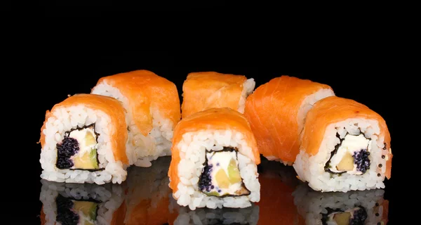 Tasty rolls isolated on black — Stock Photo, Image