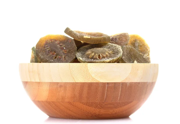 Dried tasty kiwi in wooden bowl isolated on white — Stock Photo, Image