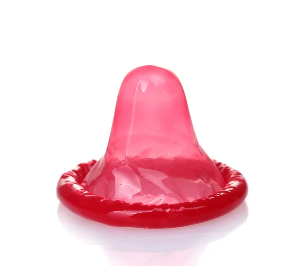白で隔離される赤のコンドーム — ストック写真