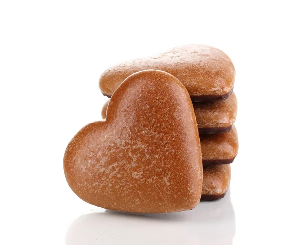 Biscotti a forma di cuore in pila isolati su bianco — Foto Stock