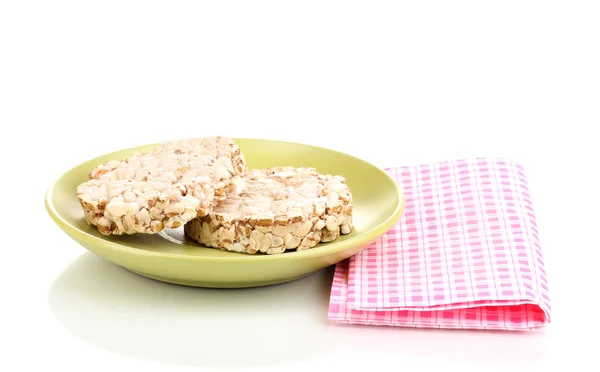 Хлебные закуски на блюдце с салфеткой изолированы на белом — стоковое фото