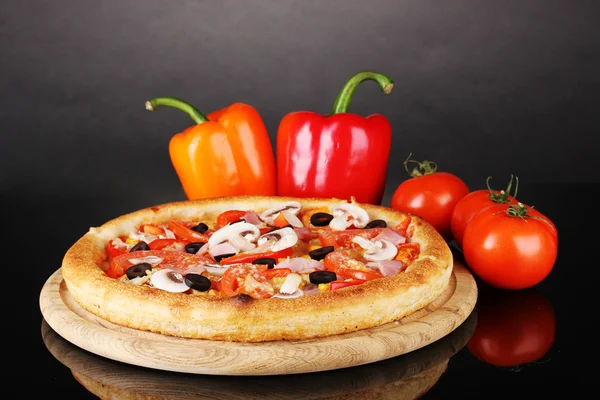 Aromatic pizza with vegetables isolated on black — Stock Photo, Image