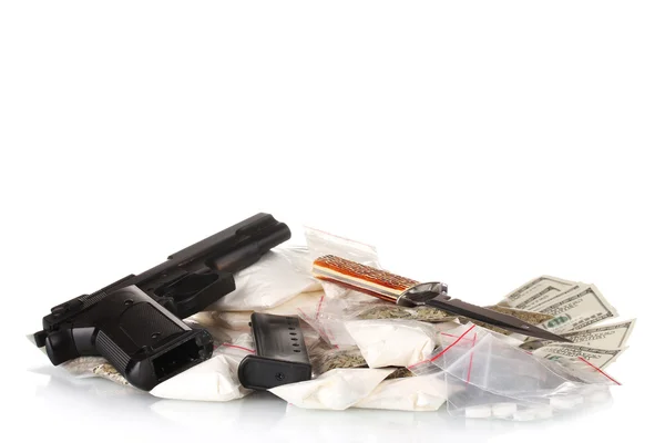 Cocaine and marijuana in packet with gun isolated on white — Stock Photo, Image