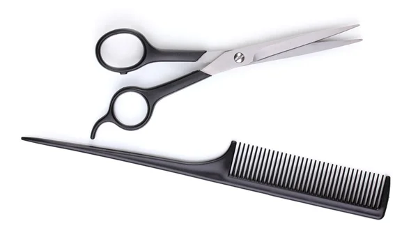 Nożyce do cięcia włosów i grzebień na białym tle — Zdjęcie stockowe