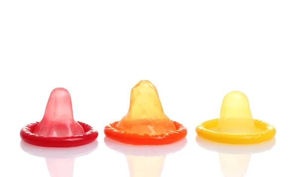 Colorful condoms isolated on white — Stock Photo, Image