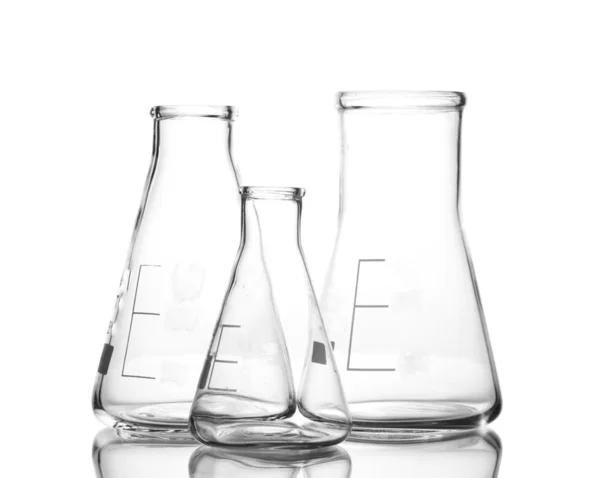 Três frascos vazios com reflexão isolada sobre branco — Fotografia de Stock