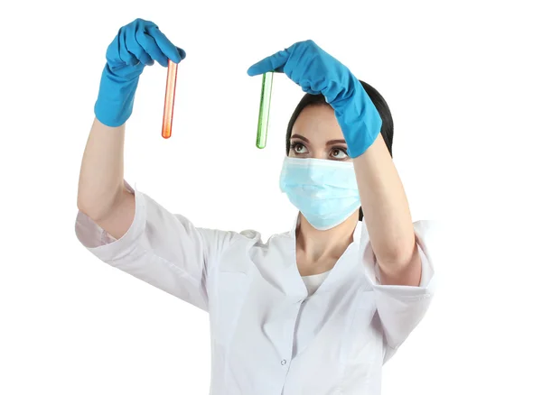 Young female scientist holding test-tubes isolated on white — Stock Photo, Image