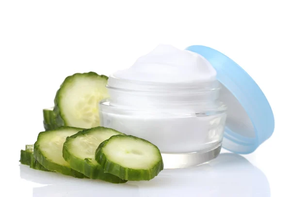 Cream and fresh sliced cucumber isolated on white — Stock Photo, Image