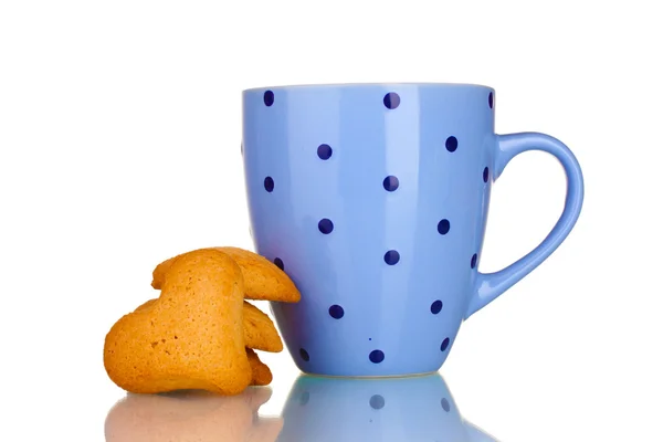 Blue cup and heart-shaped cookies isolated on white — Stock Photo, Image