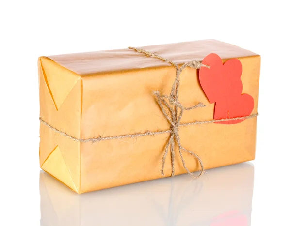 Parcel with blank heart-shaped label isolated on white Stock Photo