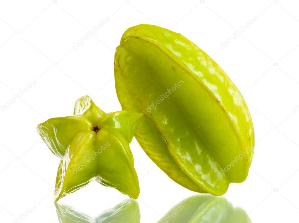 Two fresh carambola fruits isolated on white