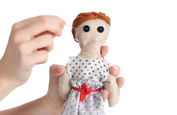 Voodoo docka flicka i händerna på kvinnor isolerade på vit — Stockfoto