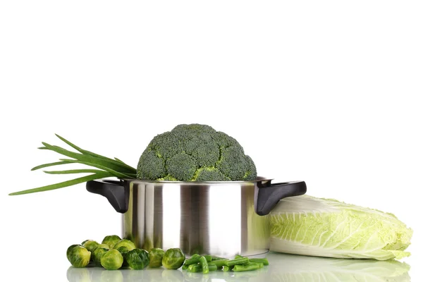 Fresh broccoli in saucepan and cabbages isolated on white — Stock Photo, Image