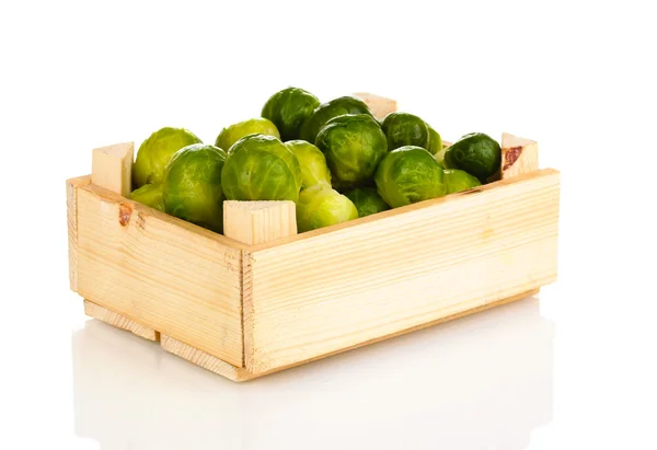 Brussels sprouts in wooden crate isolated on white — Zdjęcie stockowe