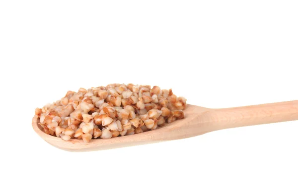 Wooden spoon with boiled buckwheat isolated on white — Stock Photo, Image