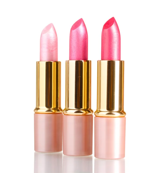 Hermosos lápices labiales rosados aislados en blanco —  Fotos de Stock