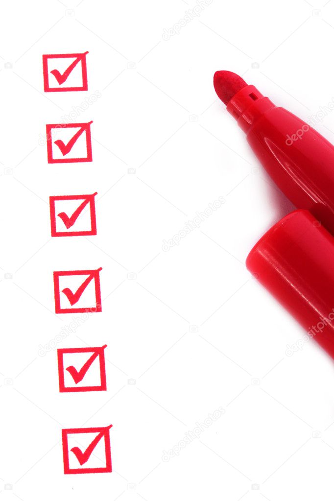Checklist and red marker closeup