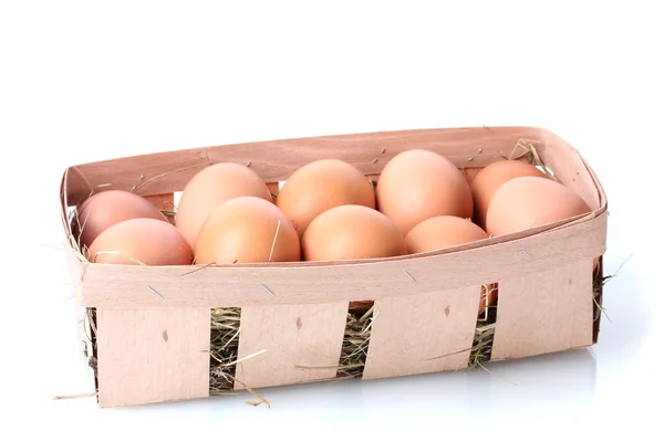Brown eggs in box isolated on white — Stock Photo, Image