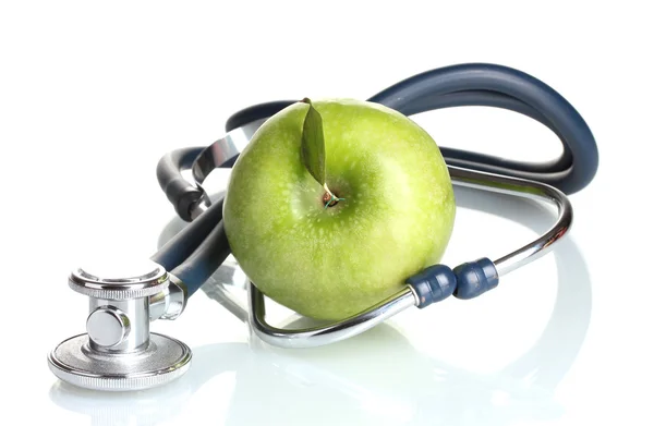 Ιατρική στηθοσκόπιο και πράσινο μήλο που απομονώνονται σε λευκό — Φωτογραφία Αρχείου
