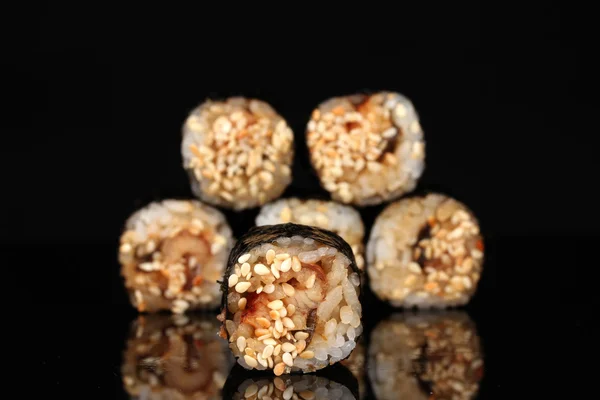 Tasty rolls isolated on black — Stock Photo, Image