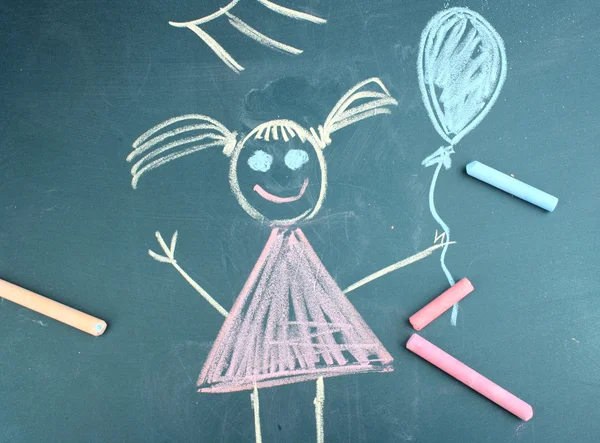 Liten flicka, barn ritade med krita — Stockfoto