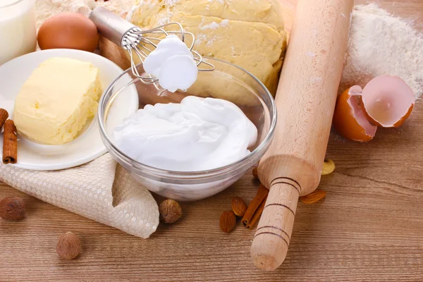 Ingredients for the dough wooden table — Stock Photo, Image