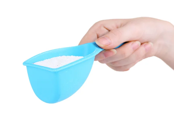 Blauer Behälter mit Waschmittel in der Hand, isoliert auf weiß — Stockfoto