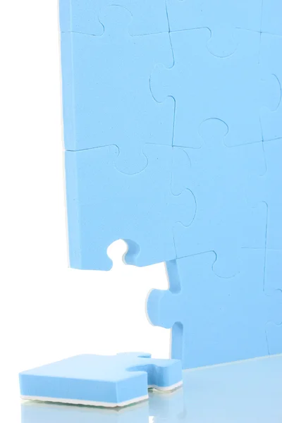 Puzzles azuis closeup, isolado em branco — Fotografia de Stock