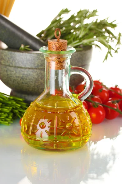 Rosemary in mortar, oil in jar, tomatoes cherry, and green onion isolated o — Stock Photo, Image
